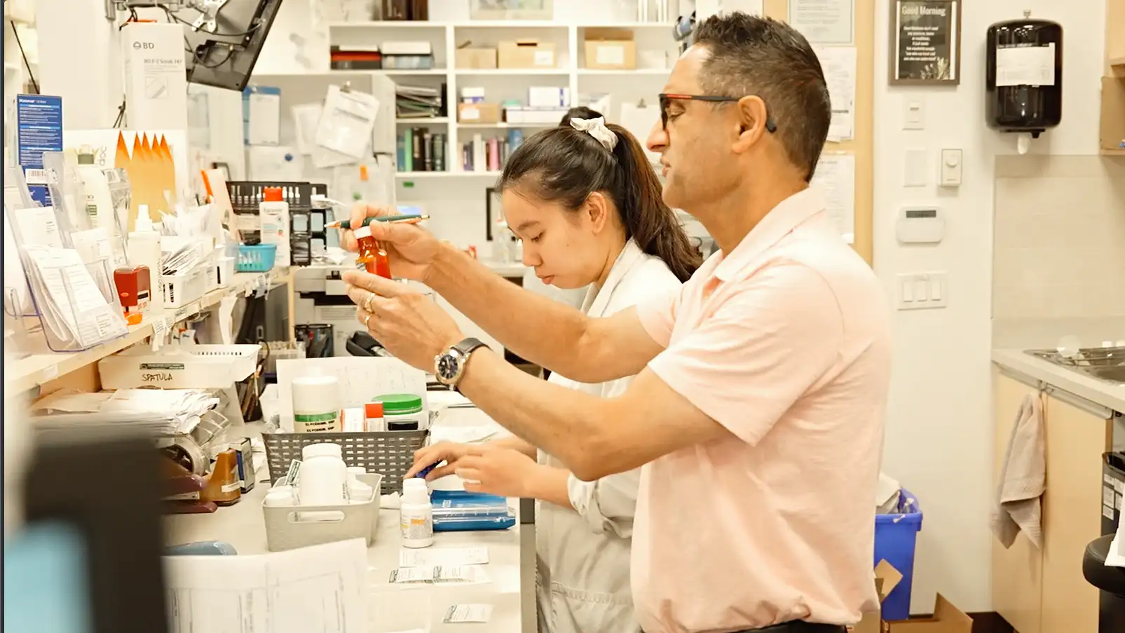 Pharmacists preparing compounded medication at Surlang Pharmacy in Surrey